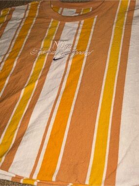 Nike Women’s Vertical Stripe Short-Sleeve Tee in Yellow